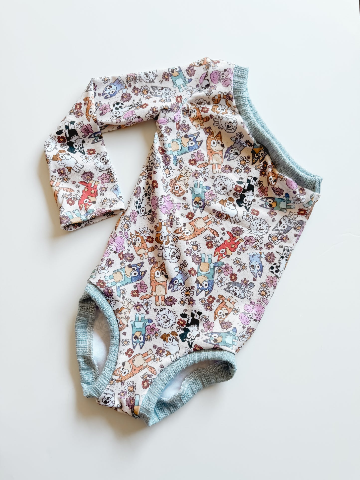 Daisy Heeler One Shoulder Long Sleeve Leo