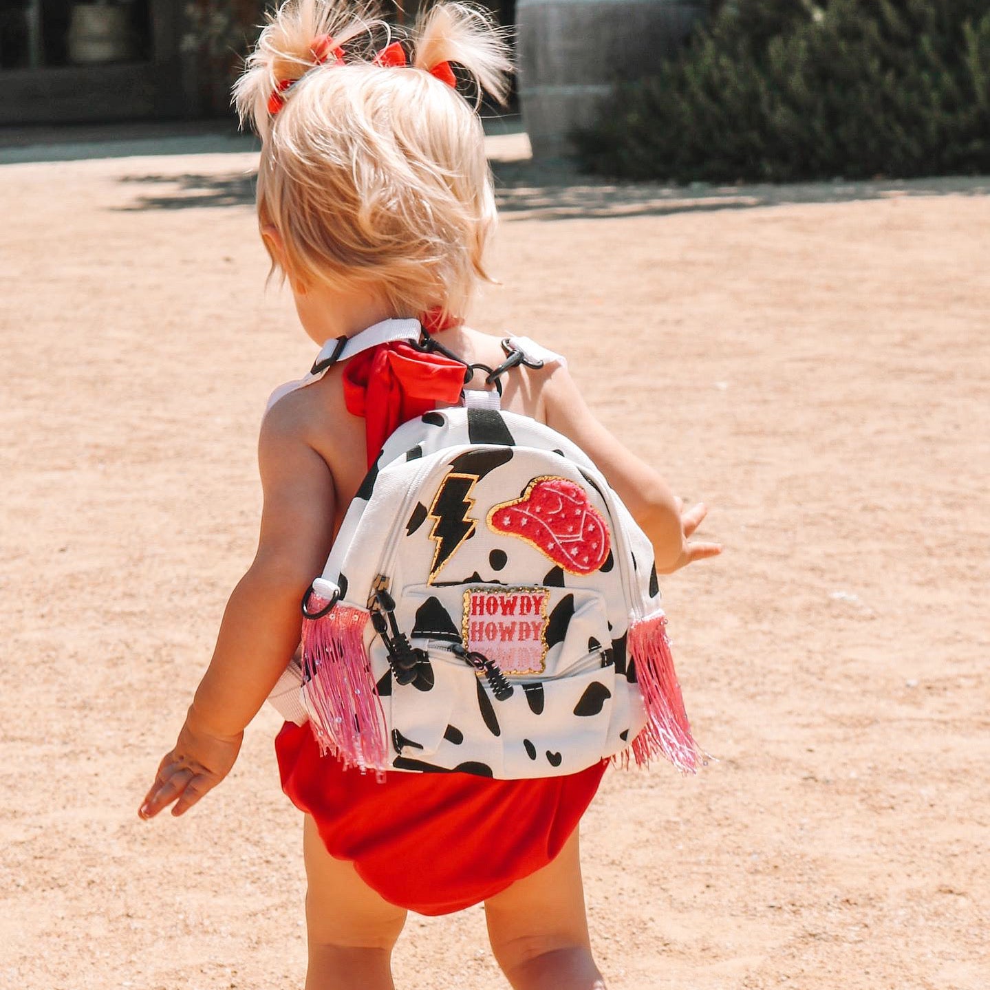 Brinsey & Co. Mini Fringe Cow Backpack